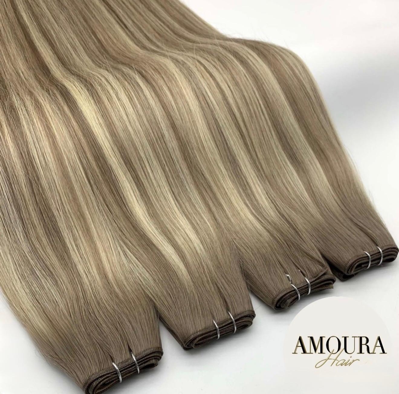 Hair extensions by Amoura Hair